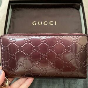 Gucci GG Signature Patent Leather Continental Wallet